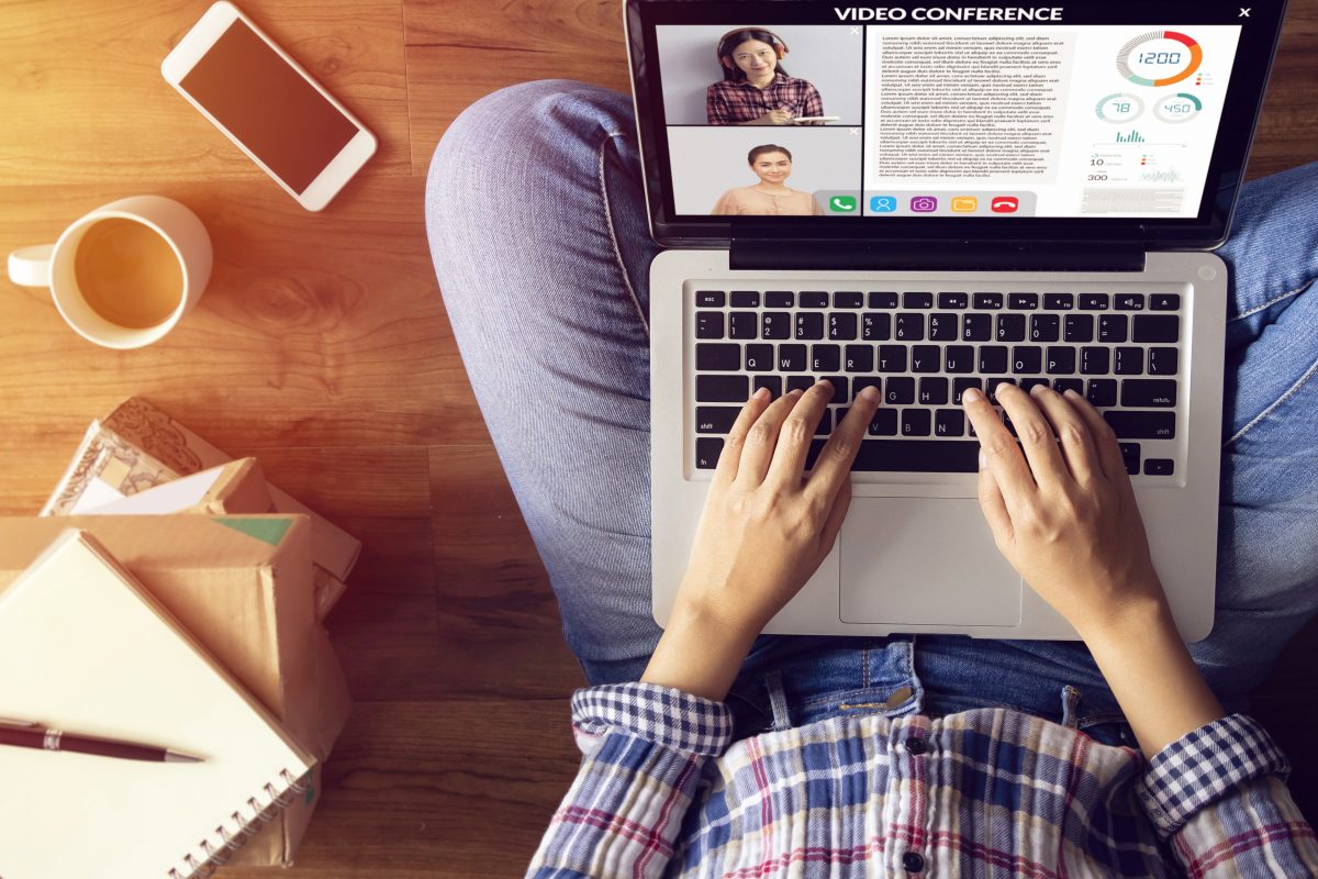 work from home. people making video conference with colleague via laptop computer during home quarantine to avoid spreading illness transmission of COVID-19 Coronavirus outbreak. Social distancing