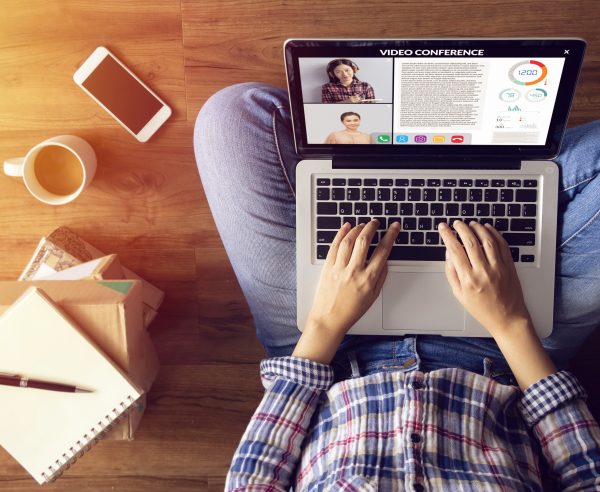 work from home. people making video conference with colleague via laptop computer during home quarantine to avoid spreading illness transmission of COVID-19 Coronavirus outbreak. Social distancing