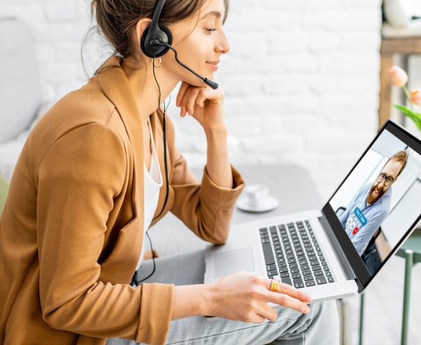 work from home. people making video conference with colleague via laptop computer during home quarantine to avoid spreading illness transmission of COVID-19 Coronavirus outbreak. Social distancing