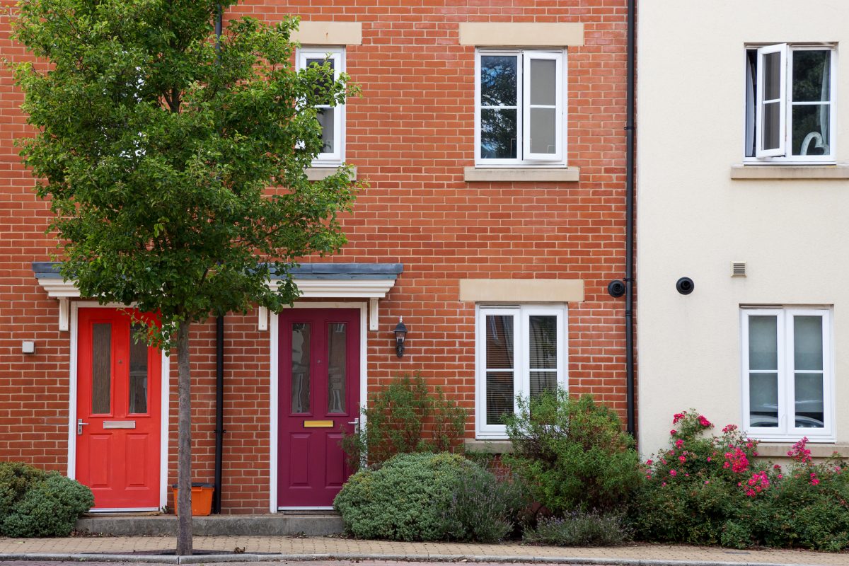 Residential terrace houses or flats in a town or city, England.